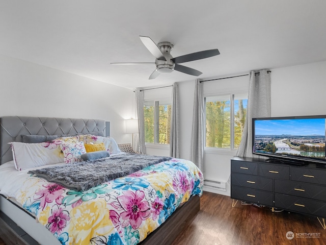 bedroom featuring a baseboard radiator, ceiling fan, and dark hardwood / wood-style floors