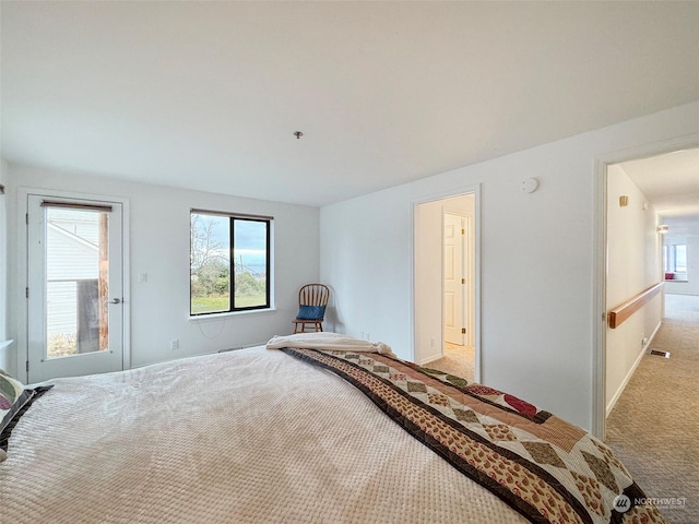 bedroom with light colored carpet