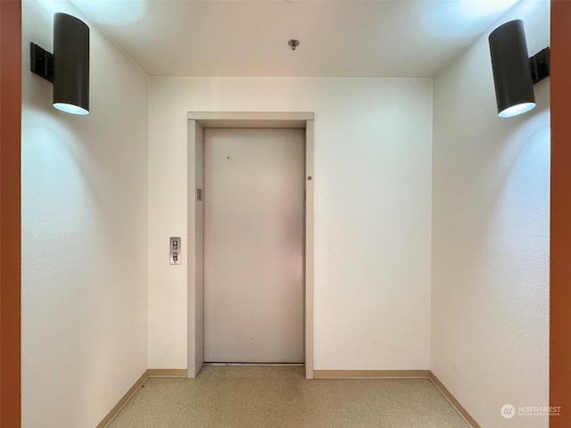 property entrance featuring elevator