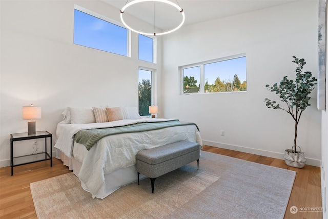 bedroom with light hardwood / wood-style floors