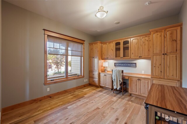 1114 S Wells, East Wenatchee, WA 98802 - office featuring built in study area, light wood finished floors, and baseboards
