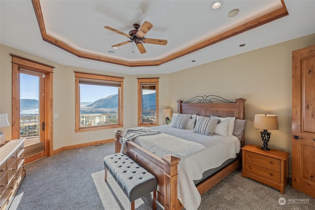 1114 S Wells, East Wenatchee, WA 98802 - carpeted bedroom with a tray ceiling, access to exterior, recessed lighting, ceiling fan, and baseboards