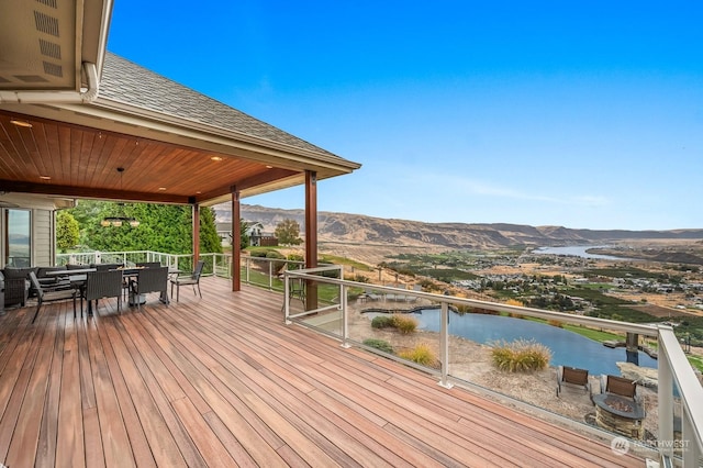 1114 S Wells, East Wenatchee, WA 98802 - wooden terrace featuring outdoor dining area and a water and mountain view