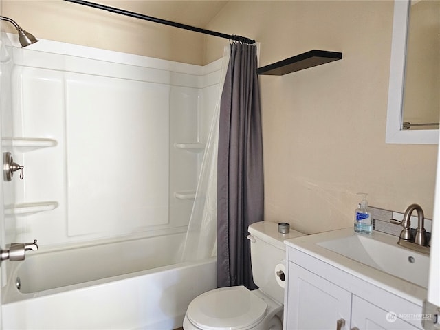 full bathroom featuring vanity, toilet, and shower / bathtub combination with curtain