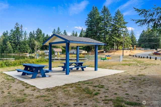 view of community featuring a gazebo and a water view