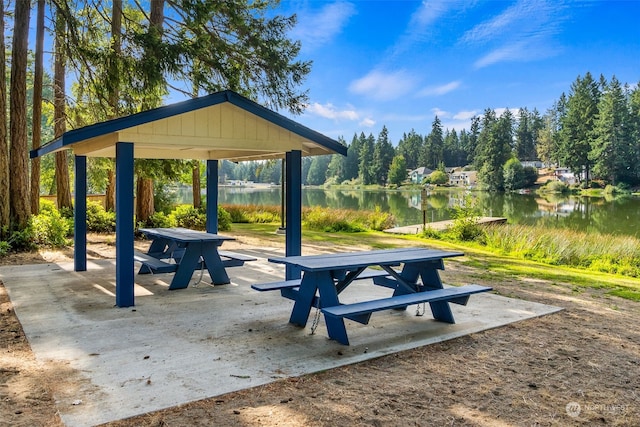 view of property's community with a gazebo and a water view