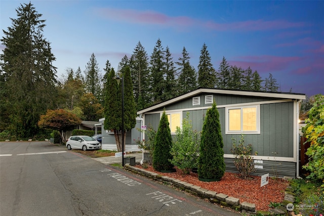 view of property exterior at dusk