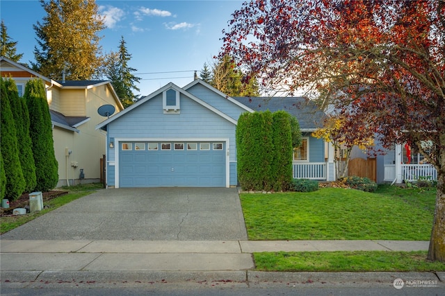 view of front of home with covered porch, a garage, and a front lawn