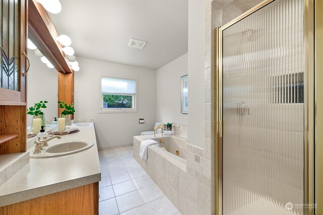 bathroom with vanity, plus walk in shower, and tile patterned flooring