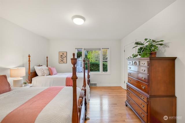 bedroom featuring light hardwood / wood-style floors