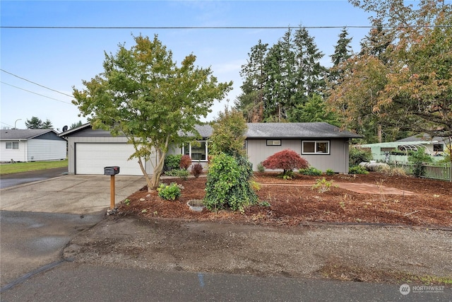 single story home featuring a garage