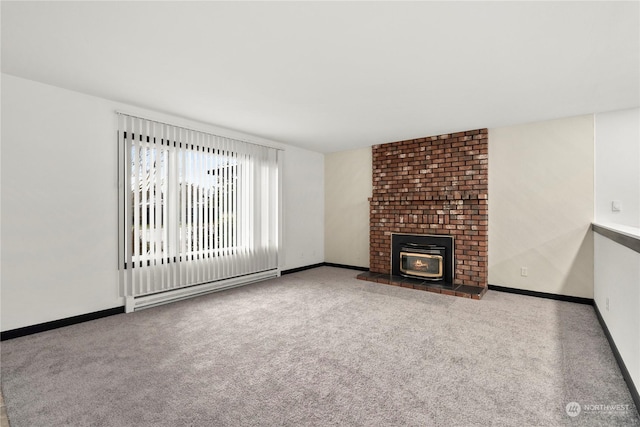 unfurnished living room featuring light carpet