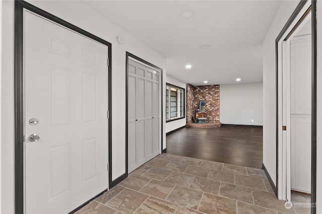 hall with wood-type flooring