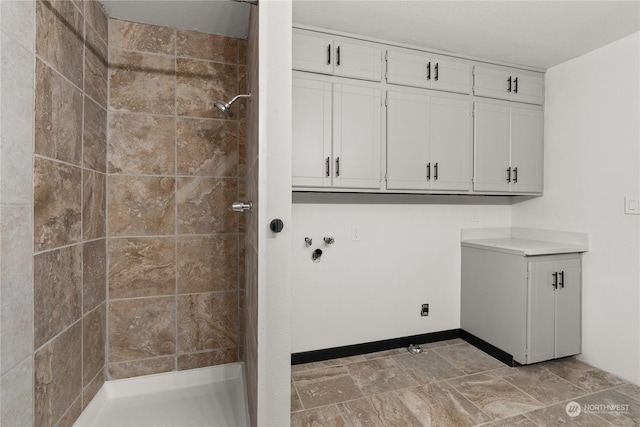 laundry area with cabinets and washer hookup