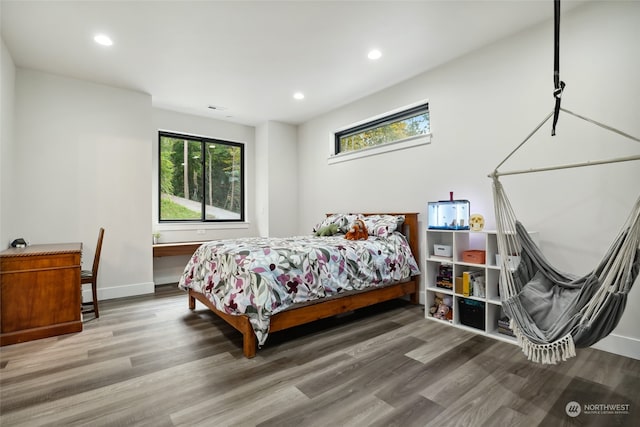 bedroom featuring hardwood / wood-style floors