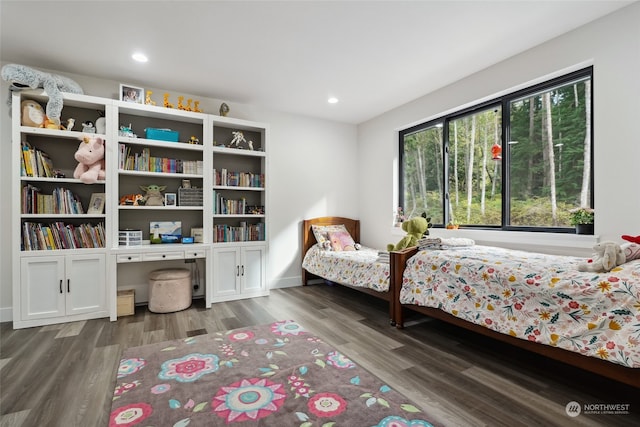 bedroom featuring dark hardwood / wood-style floors