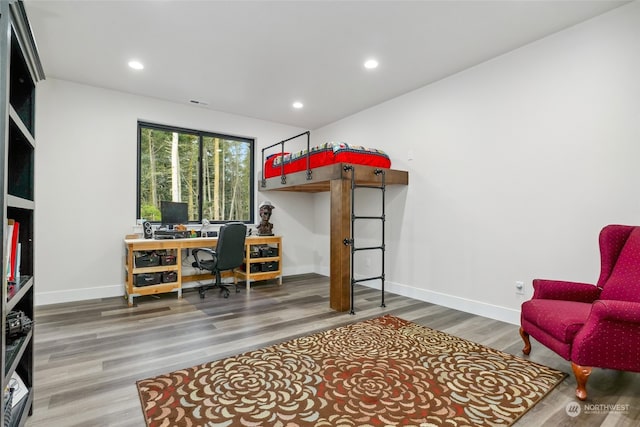 home office featuring hardwood / wood-style flooring