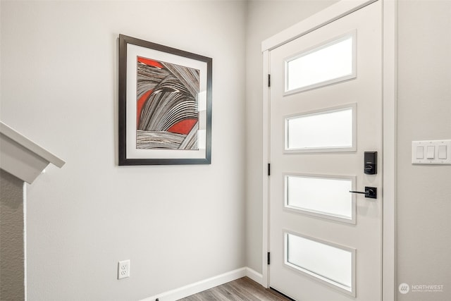 doorway to outside featuring hardwood / wood-style floors