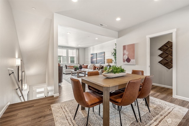 dining room featuring hardwood / wood-style flooring