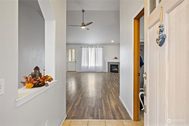 interior space featuring hardwood / wood-style flooring and ceiling fan