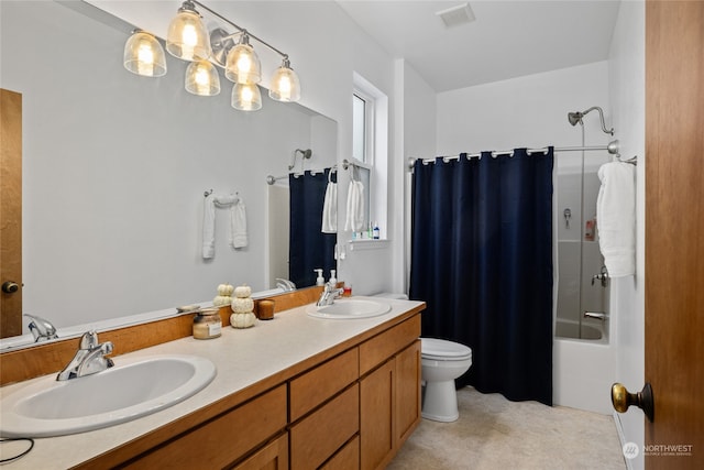 full bathroom with vanity, toilet, and shower / tub combo with curtain