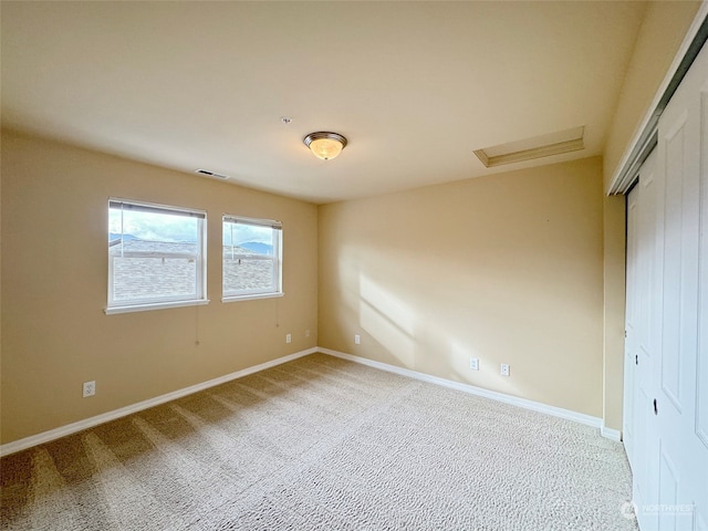 unfurnished bedroom featuring carpet