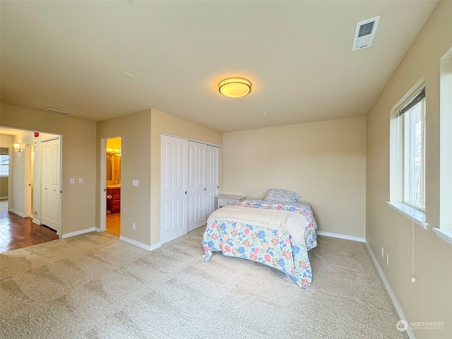 bedroom with light carpet