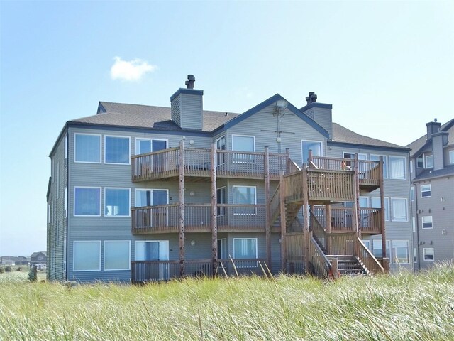 1399 Ocean Shores Blvd SW Unit 2N-E, Ocean Shores, WA 98569 - back of property with a chimney