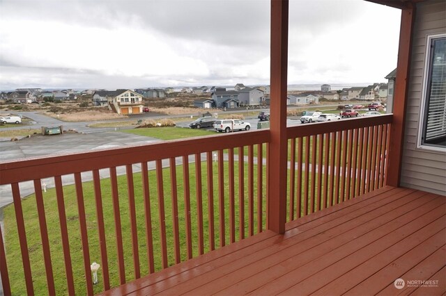 1399 Ocean Shores Blvd SW Unit 2N-E, Ocean Shores, WA 98569 - wooden terrace with a residential view and a yard