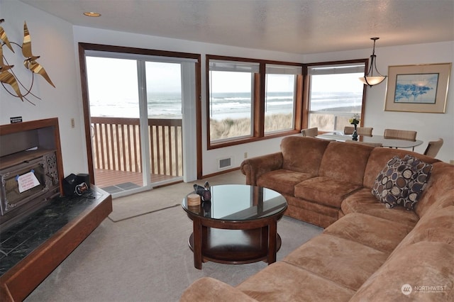 1399 Ocean Shores Blvd SW Unit 2N-E, Ocean Shores, WA 98569 - carpeted living area featuring a water view