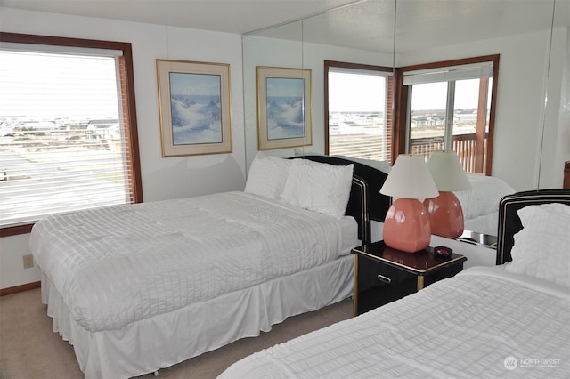 1399 Ocean Shores Blvd SW Unit 2N-E, Ocean Shores, WA 98569 - bedroom with carpet flooring