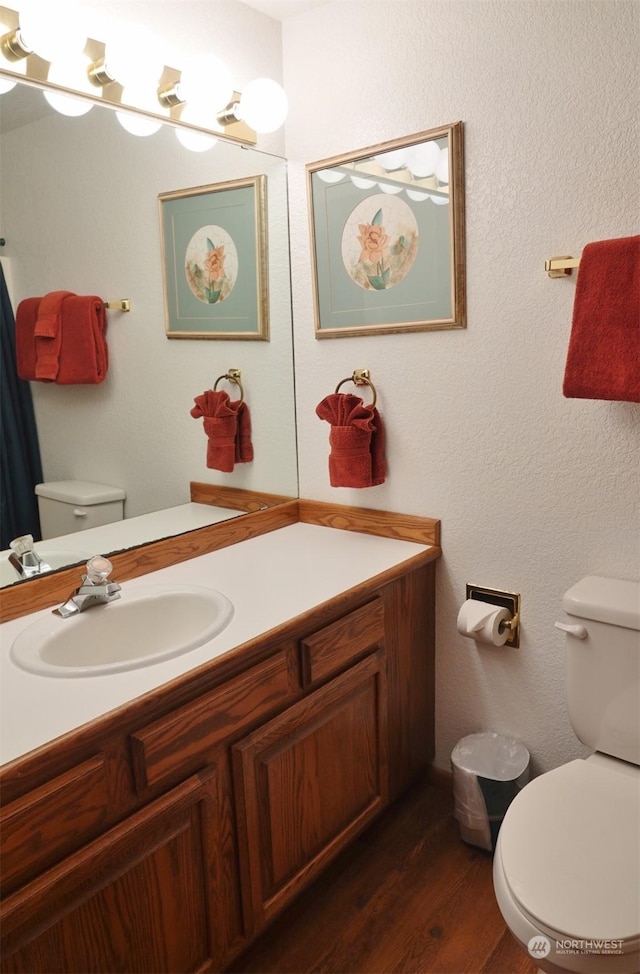1399 Ocean Shores Blvd SW Unit 2N-E, Ocean Shores, WA 98569 - bathroom featuring wood finished floors and vanity