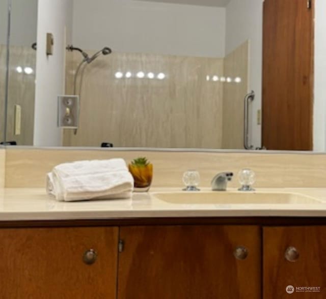 1810 S 118th Unit 401, Seattle, WA 98168 - full bathroom featuring double vanity and a shower