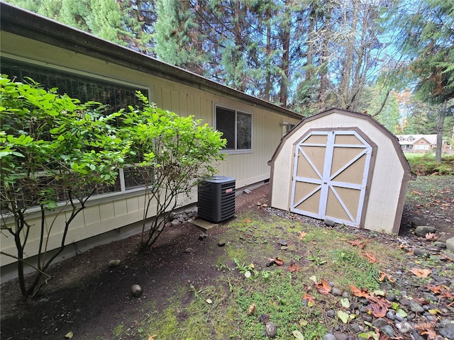 view of outdoor structure featuring central AC unit