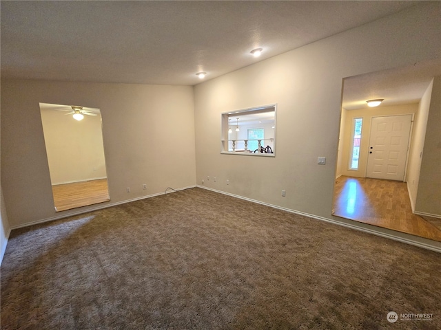 unfurnished room with a textured ceiling, hardwood / wood-style flooring, and ceiling fan