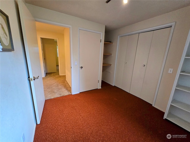 unfurnished bedroom with carpet