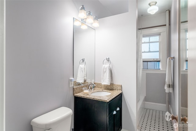 full bathroom featuring vanity, toilet, and shower / bathtub combination with curtain