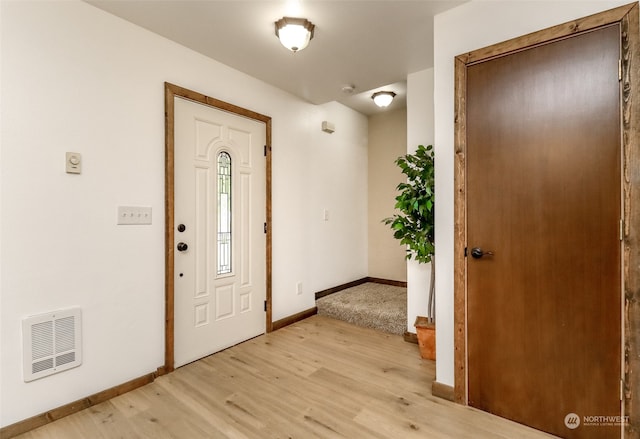 foyer entrance featuring light hardwood / wood-style floors