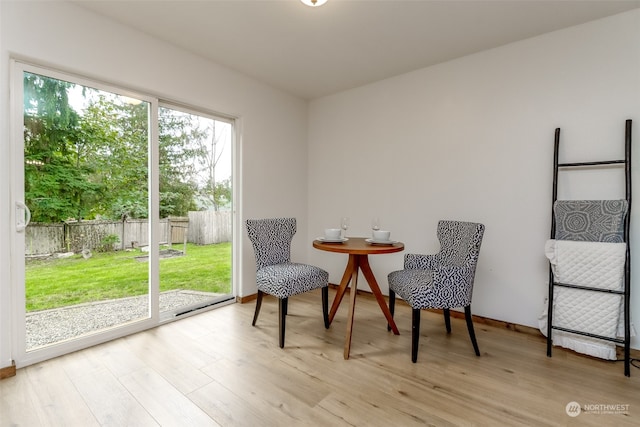 sitting room featuring light hardwood / wood-style floors