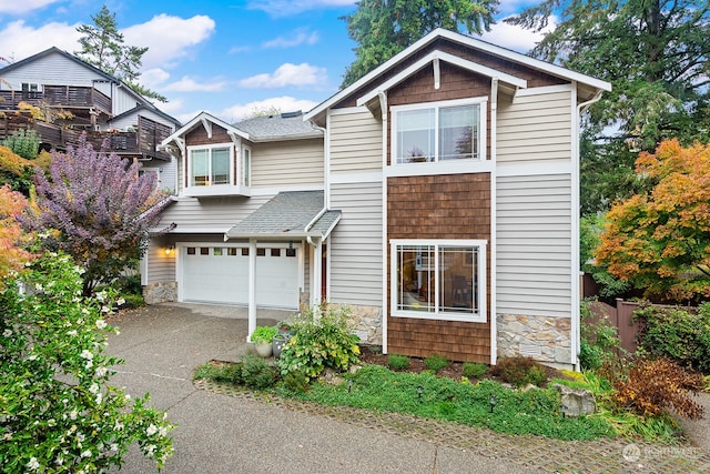 view of front of property with a garage