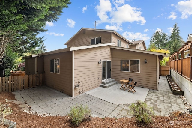 back of house featuring a patio area