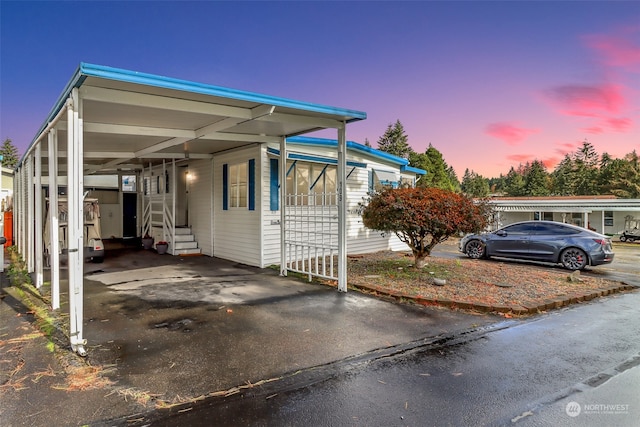 view of front facade featuring a carport