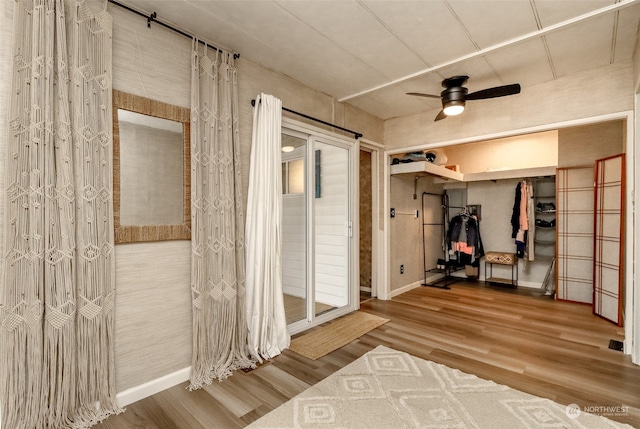 mudroom featuring ceiling fan and hardwood / wood-style floors