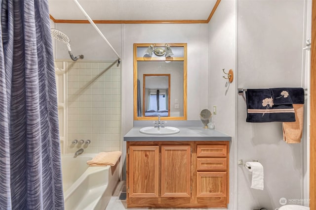 bathroom with vanity, crown molding, and shower / tub combo with curtain