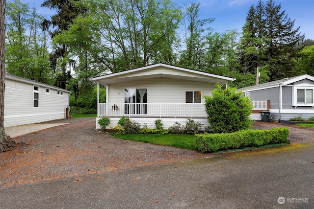 manufactured / mobile home featuring covered porch