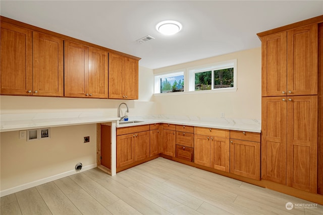 23405 NE 73rd St, Redmond, WA 98053 - kitchen with sink and light hardwood / wood-style flooring