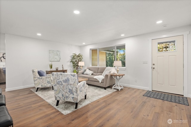 living room with light hardwood / wood-style floors