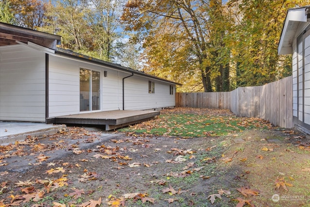 view of yard featuring a wooden deck