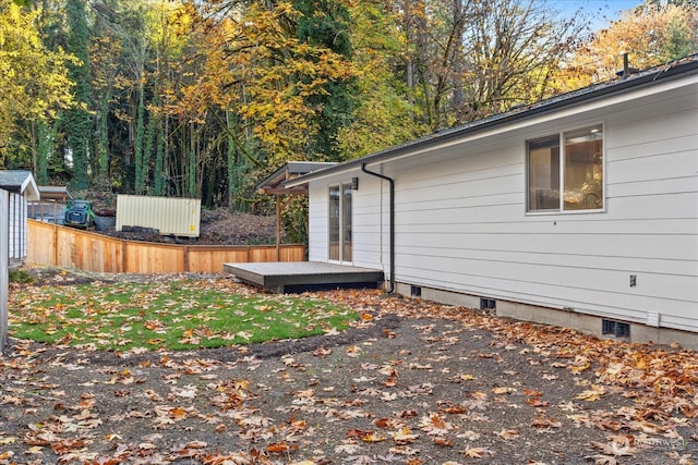 exterior space featuring a wooden deck