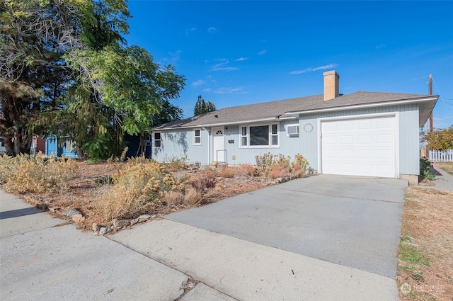 single story home with a garage